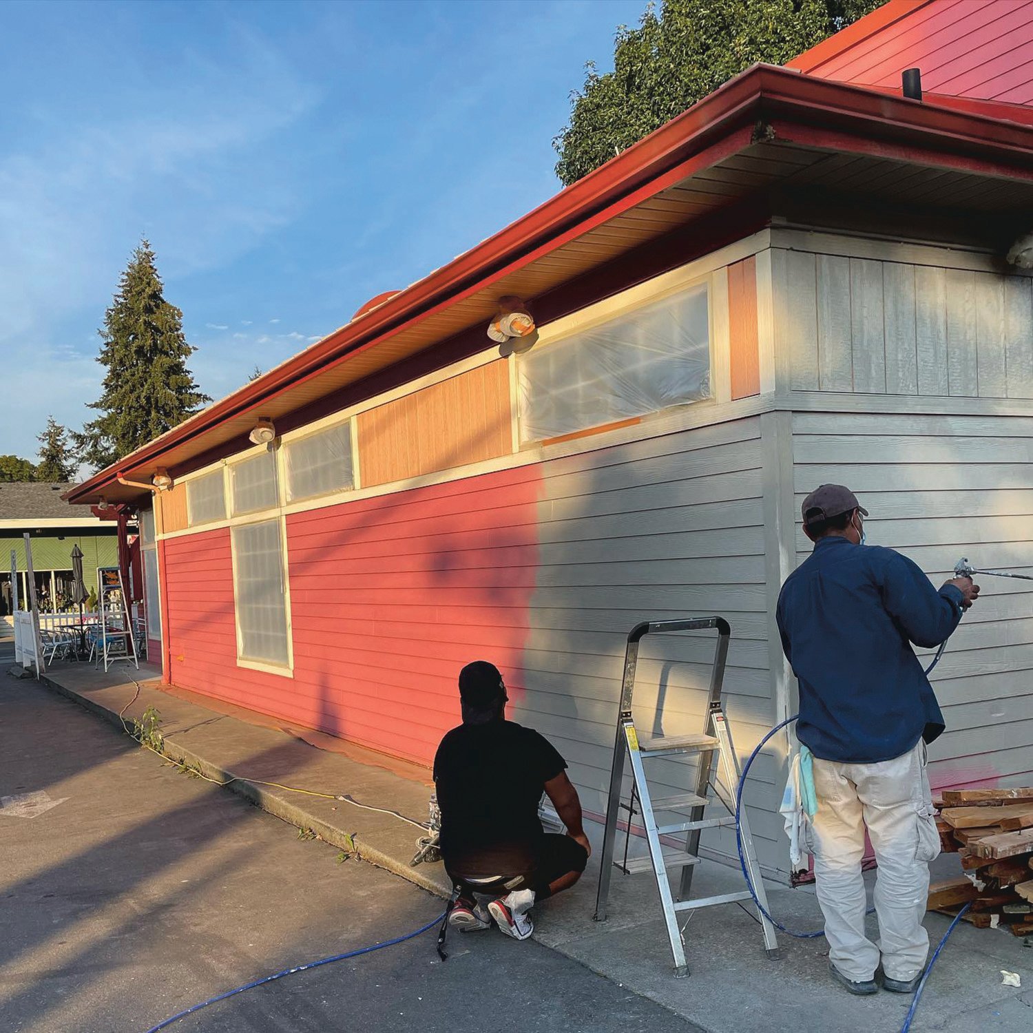 A new coat of paint is applied to the exterior of the The Local, a new sports bar and restaurant that plans to open in Yelm later this month.